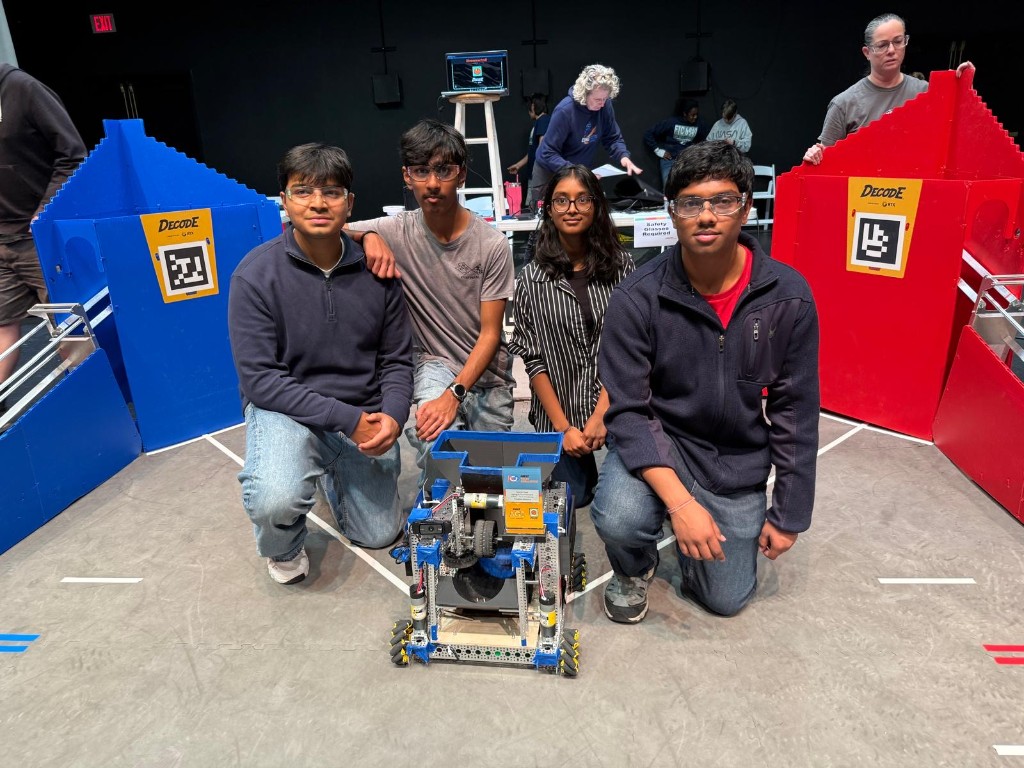 Cyber Strix team with robot at competition